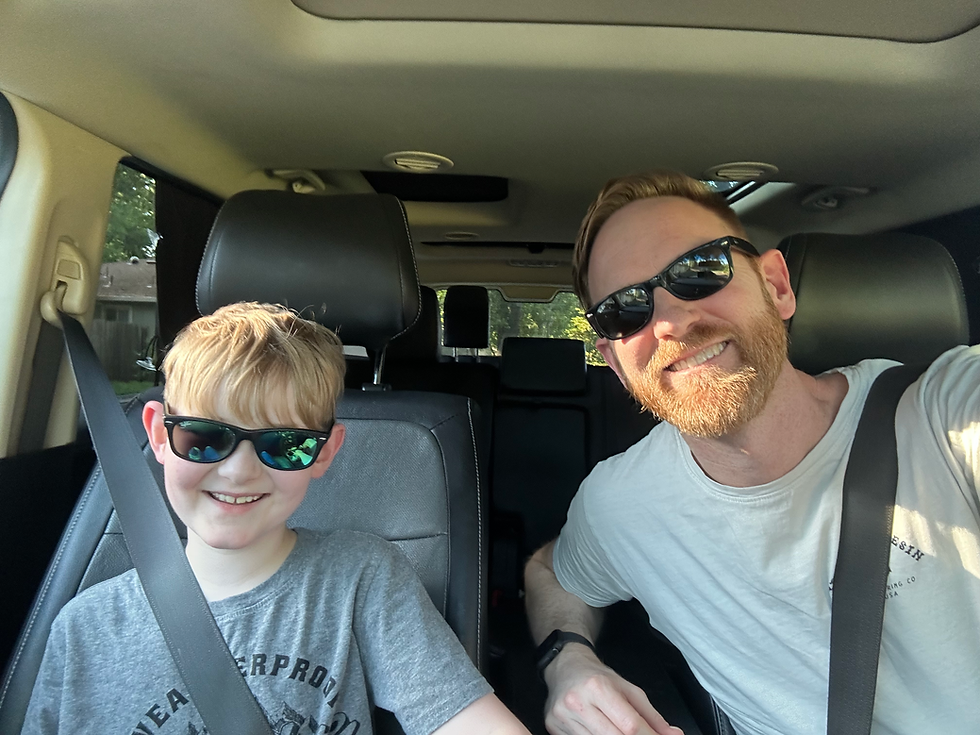 Photo of a dad and son together, warm family moment