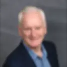 Stephen McKay discussing racing strategy at the stables