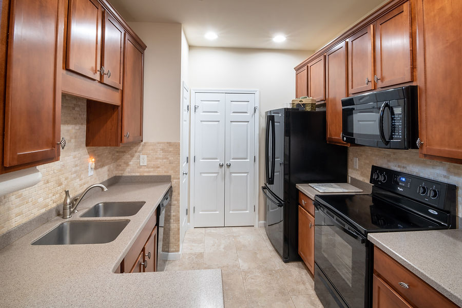 wooden-kitchen-cabinets-and-sink-4119836