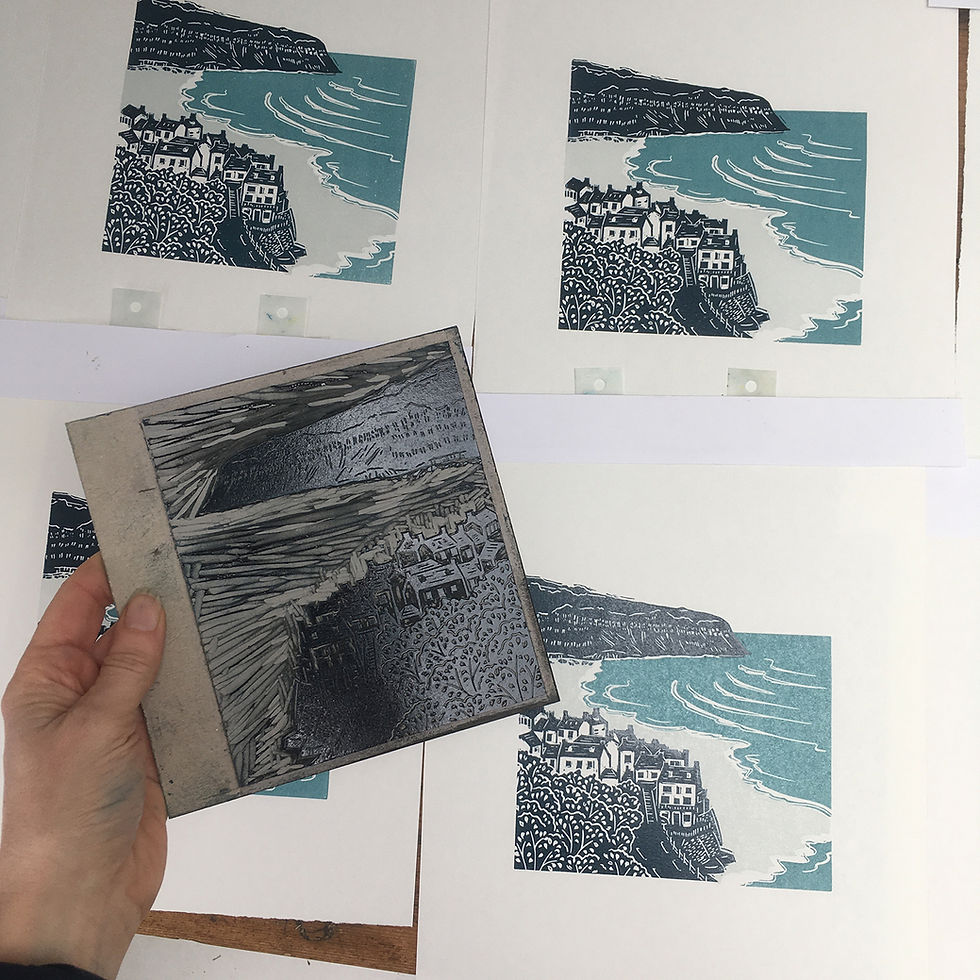 Thumbnail: Printing the key block – Indigo blue layer in Robin Hood’s Bay III linocut print