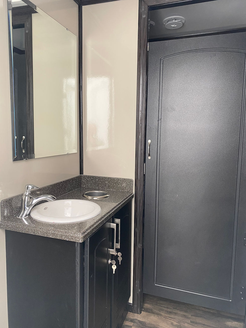 Comfort Star 4 portable restroom vanity and sink.