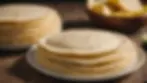 Eye-level view of a stack of freshly made tortillas