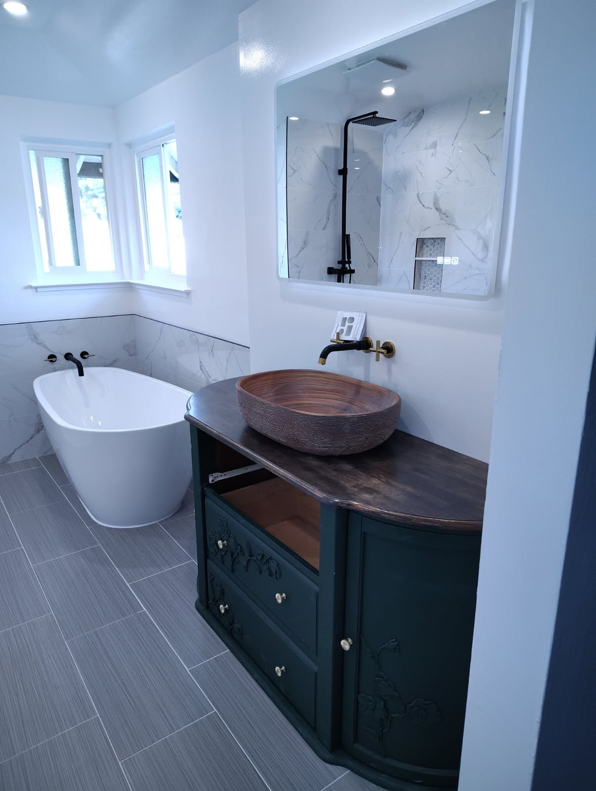 Bathroom Remodel with custom tile work.