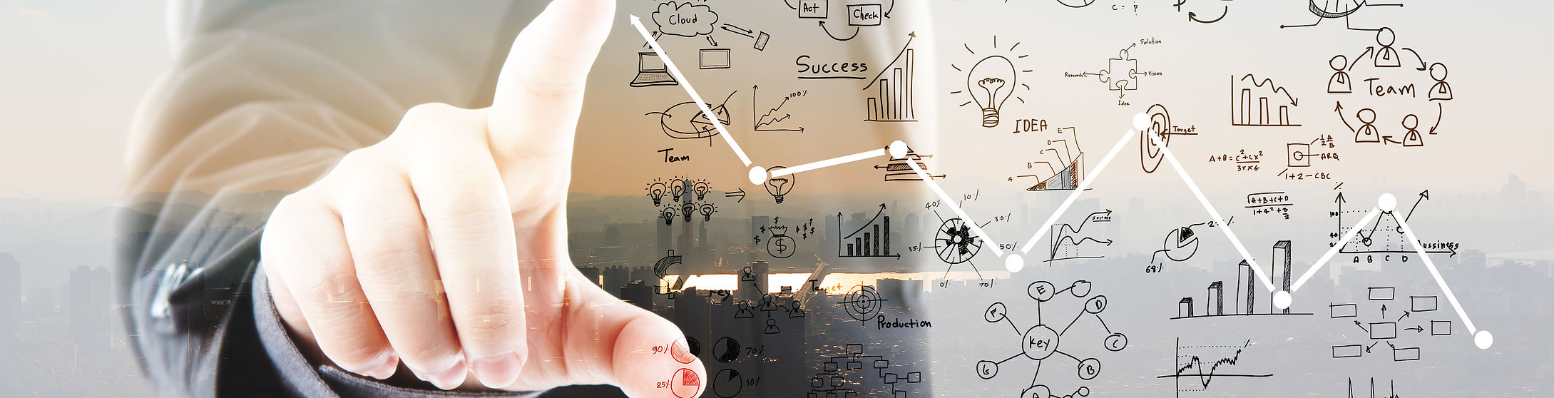 businessman-pointing-graphs-symbols.jpg