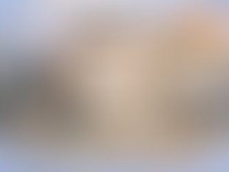 Photorealistic infographic-style image dated “February 27” with the headline “Moving to Canada Checklist!” set over a scenic Canadian background with snowy mountains, a sunrise sky, and distant city landmarks including the CN Tower, plus a Canadian flag on a hill. In the center, a large clipboard shows a checklist titled “Get Your Visa” with green check marks next to steps such as: “Organize Important Documents,” “Plan Your Finances,” “Find a Place to Live,” “Book Your Flight,” “Prepare for Jobs,” “Pack Your Essentials,” and “Learn About Canada,” with small travel icons beside the items. On the left, a smiling couple sits beside packed suitcases and holds a passport, surrounded by money, a calculator, and a piggy bank. On the right, a panel titled “Great Career Opportunities” lists “Strong Job Market,” “Fair Wages,” and “Work-Life Balance,” with a piggy bank and cash icon nearby. Additional objects include a suitcase filled with documents, a water bottle with a maple leaf, and travel p