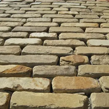 Cobble Pavers loosely arranged to create outdoor flooring