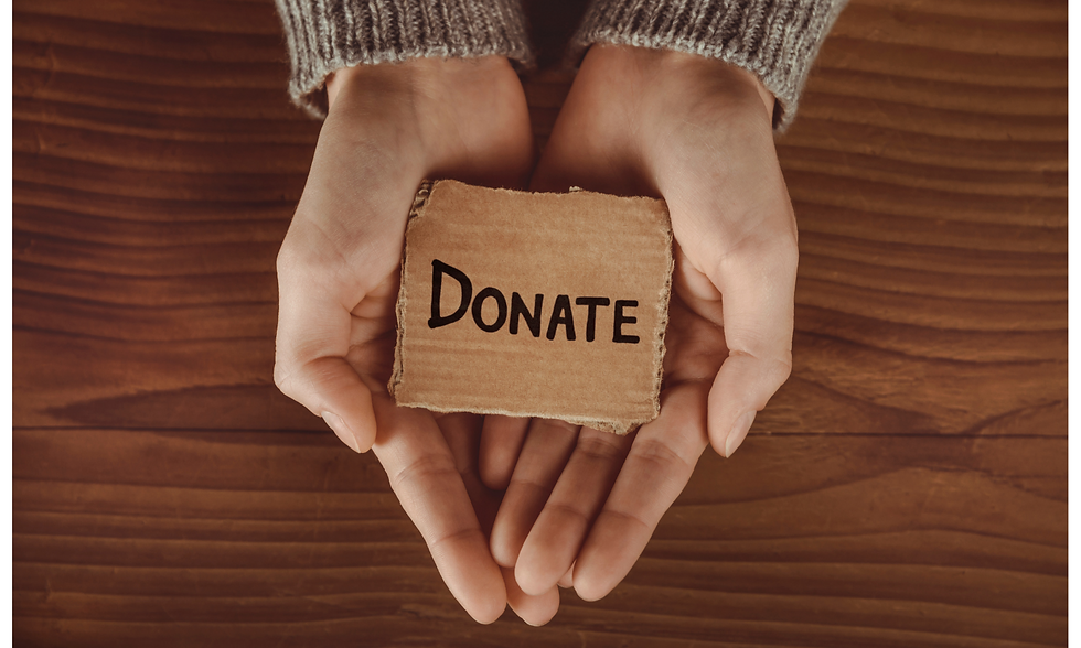 Hands holding Donate sign