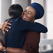 Woman hug another woman.png