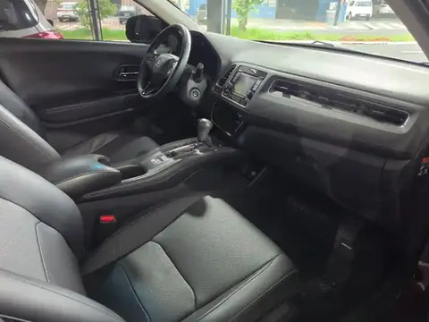 Interior do Honda HR-V Ex, com bancos de couro