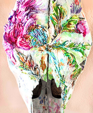 Mixed media artwork of a cow skull named 'Thistle,' with a delicate thistle flower prominently featured on the front, combini
