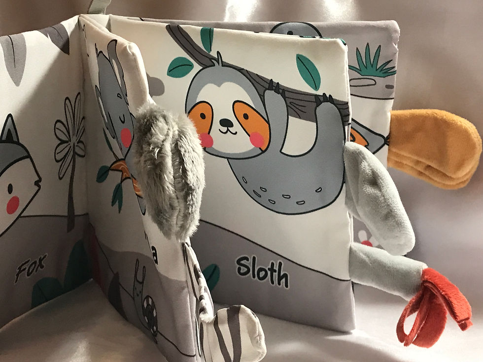 Thumbnail: Awesome baby gift basket done in an elephant theme.  To start a large galvanized bucket with wooden handles.  A sweet super soft 17" plush elephant dressed up in a bunny suit covered with little yellow and white baby chicks.  Next an after bath hooded elephant towel and a sweet elephant and friends crinkle and rattle book.  All wrapped up in a pretty coordinating grey and white polka dot bow.  The is a small silicone key chain with an elephant and pink and grey beads, hanging from the bow for Mom.