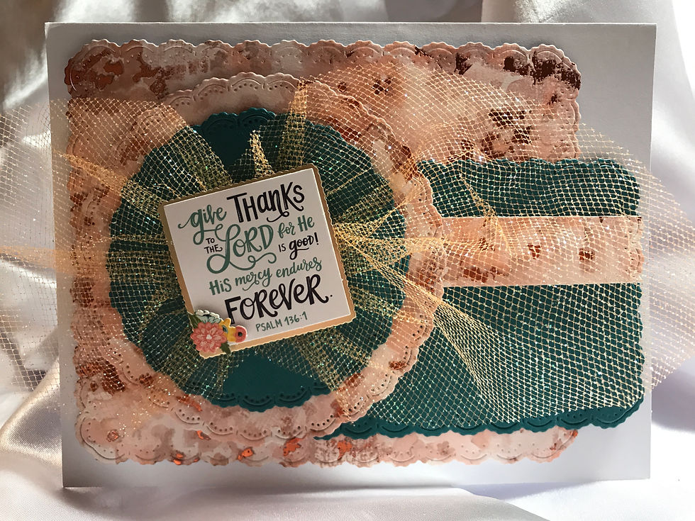 Beautiful peach, orange, and teal christian card with Give Thanks to the Lord." Psalm  118.1.  Scalloped rectangle with an orange and peach background some in foil.  Scalloped teal rectangle then two circles that are scalloped in repeating colors with a gathered peach tulle under the Psalm.