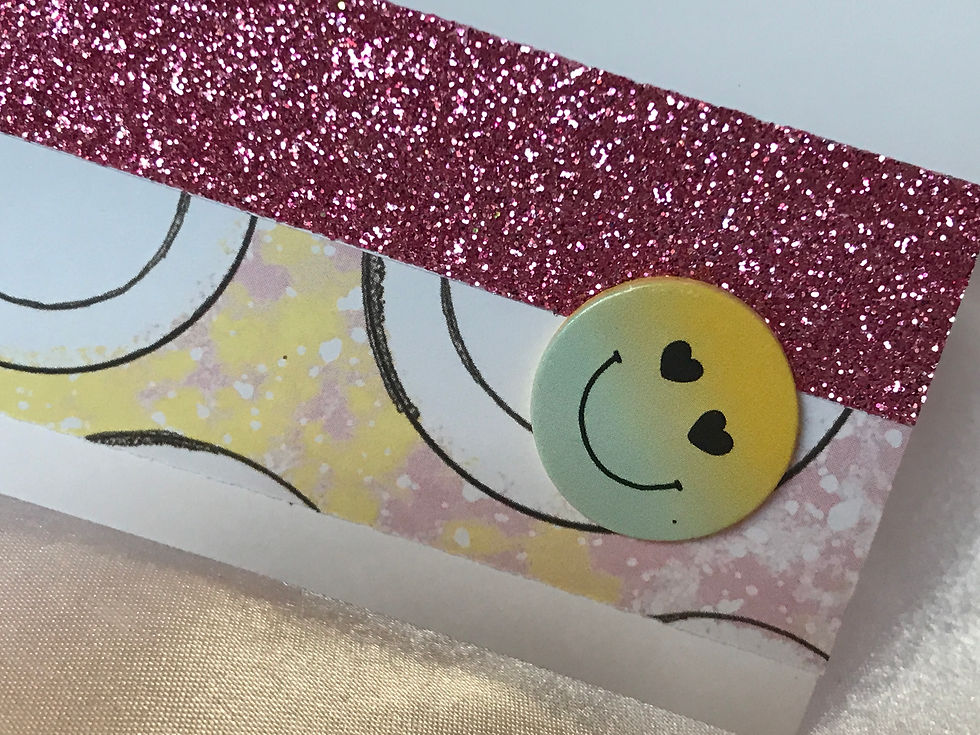 Thumbnail: Retro PEACE card in orange, yellow, teal, and pink.  Scalloped die cuts hold the peace sign and a sweet little travel trailer.  Pink glitter and ribbon embellishments.