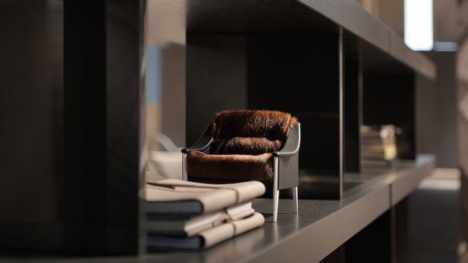 Gli Oggetti The Miniatures by Poltrona Frau displayed as a miniature armchair inspired by the iconic Poltrona Frau furniture design