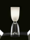 Standalone Alma lamp with a softly diffused upper shade and transparent base, emphasising its elegant and minimal form