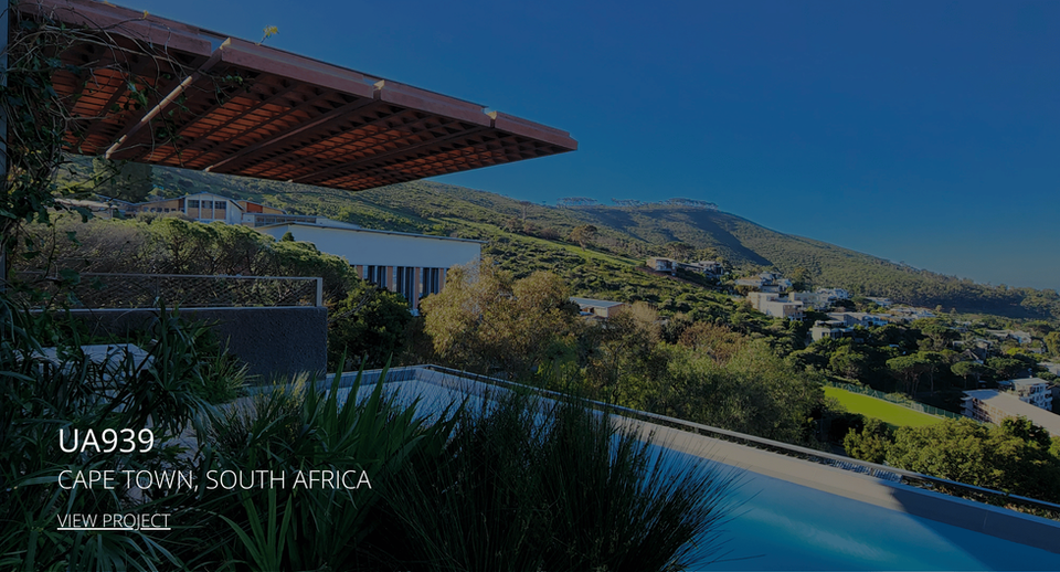 Brise soleil installation with a panoramic city view providing modern design and shade.