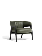 Rear view of the DUO lounge armchair by Poltrona Frau highlighting its clean lines and structural frame