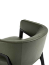 Rear detail of the DUO lounge armchair by Poltrona Frau highlighting the curved backrest and open frame design