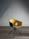 Ginger Ale chair with four-spoke base shown in a studio setting, highlighting the curved shell seat and open back detail