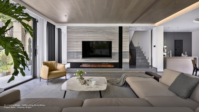 Archibald armchair by Poltrona Frau styled within a contemporary residential interior, demonstrating its iconic silhouette and lounge comfort