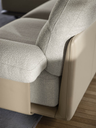 Detail of the Blisscape sofa by Poltrona Frau focusing on the armrest and transition between structure and cushioning