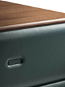 Close-up of the drawer front highlighting the integrated handle and soft contours of the structure
