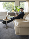 Side view of the Blisscape sofa by Poltrona Frau highlighting the depth of the seat and layered cushion structure