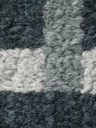 Close-up of the Dizzy rug by Poltrona Frau showing the dense pile and variation in surface pattern