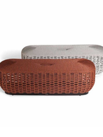 Grant outdoor ottoman 121cm by Poltrona Frau displayed as a standalone piece emphasising its elongated shape and woven construction