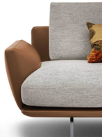 Close-up of the Get Back sofa by Poltrona Frau showing the armrest and transition between materials