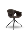 Angled studio view of the Ginger Ale chair showing the sculpted seat form and open back detail