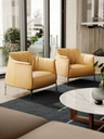 Archibald armchairs by Poltrona Frau arranged in a living room setting showcasing comfort and contemporary design