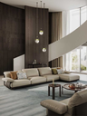 Blisscape sofa by Poltrona Frau styled in a contemporary living room with tables and accessories, showing its integration into a refined interior