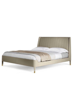 Three-quarter view of the Suzie Wong bed showing the depth of the headboard and the low base