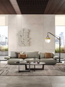 Blisscape sofa by Poltrona Frau placed within a contemporary room with tables and decor, emphasising its role as a central seating element
