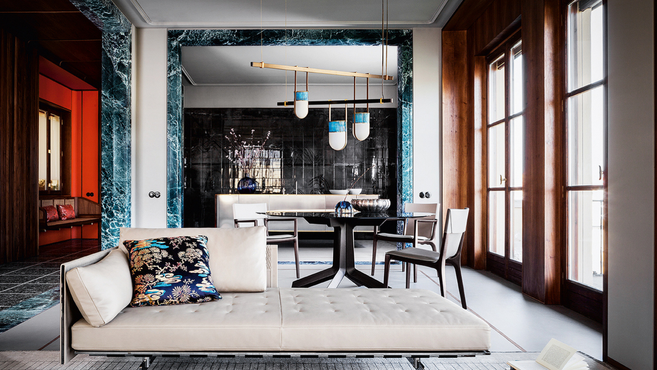 Isadora chair by Poltrona Frau designed by Roberto Lazzeroni arranged within a contemporary residential interior highlighting the refined dining chair design