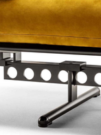Detail of the Overture sofa by Poltrona Frau highlighting the junction between the seat cushion and structural frame