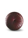 Top view of the Esedra by Poltrona Frau highlighting the radial stitching and circular design