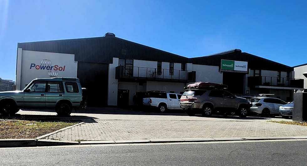 Off-shutter factory façade panels installed into steel frames, two sites.