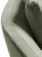 Detail of the Duo sofa by Poltrona Frau highlighting the curved backrest and seamless upholstery