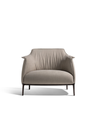 Front view of the Archibald Large armchair by Poltrona Frau showing its wide seat and enveloping backrest