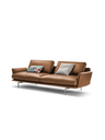 Angled view of the Get Back sofa by Poltrona Frau highlighting the layered cushions and structured base