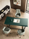 Archibald Task office chair by Poltrona Frau shown in a workspace with meeting table and seating, emphasising its functional use in a professional setting