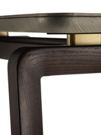Close-up of the console frame showing the connection between the top and supporting structure with refined finishing