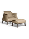 Archibald ottoman with wood base by Poltrona Frau paired with a matching armchair, highlighting the coordinated design and supportive footrest function