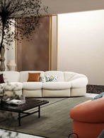 Parka modular sofa by Poltrona Frau positioned along a wall with architectural elements, emphasising its sculptural seating form