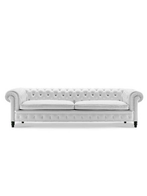 Chester One sofa by Poltrona Frau presented in a lighter variation highlighting the buttoned upholstery and balanced proportions