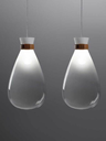Two pendant lamps displayed side by side, illustrating variation in form while maintaining the same design language