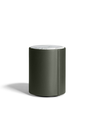 Night table displayed with a clean cylindrical form and smooth top surface, highlighting its minimal and functional design