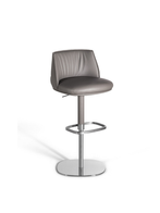 Front view of the Archibald stool with steel base by Poltrona Frau showing the upholstered seat and circular base